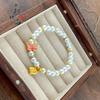 Tienda de oro con alta retención de color esmalte dorado antiguo pulsera de mariposa perla pulsera de la suerte mariposa pequeña azul quemado