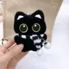 Novo Pingente de Boneca Gatinho Preto de Pelúcia Coração de Menina Squeak Pingente Versátil Pingente de Mochila Chaveiro Venda por Atacado
