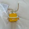 Transfronterizo 2026 Verano Lujo Ligero Estilo Francés Cadena de Perlas Nueva Elegante Cordón de Ajuste de Tira de Arrastre de Moda Bolso de Hombro Cruzado para Mujer