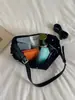 Bolso de Hombro Bajo con Remaches Retro de Alta Gama Versátil para el Viaje Diario Gran Capacidad Bolso Dumpling Nuevo para Mujer Otoño/Invierno Bolso de Hombro Único