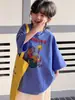 Camiseta de Manga Corta de Verano para Niño Estilo Coreano Corte Holgado Hombro Caído Top Infantil Estampado de Dibujos Animados Casual Media Manga Top de Moda para Niños
