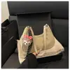 Primavera 2026 Nuevo Bolso de Axila Texturizado Vintage de Nicho Bolso Cruzado para Mujer Bolso de Empanada de Alto Valor Bolso de Hombro Simple