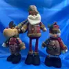 Muñecos telescópicos de pie de Navidad variados, decoraciones de muñecos de muñeco de nieve y reno de Navidad para ventana de hotel