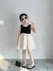 Verão 2026 Novo Estilo Roupas Infantis Coreanas Vestido Doce Estilo Hepburn para Meninas com Costas Vazadas e Laço