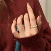 Moda Retro Elegante Anillo Abierto de Alta Gama Elegante Lujo Accesible Diseño Sencillo de Nicho Joyería de Mano Personalizada para Mujeres