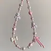 Cadena para Teléfono Móvil de Cachorro de Dibujos Animados Rosa Linda Casera Colgante de Decoración de Bolsa de Cachorro de Perla de Mariposa Colorida Colgante CCD