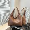 Bolsa Casual Retro de Grande Capacidade para Mulheres 2025 Nova Popular Simples Cor Pura Estilo Estrangeiro Bolsa de Ombro Bolsa Tote Tecida