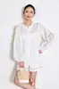 Camisa Blanca de Encaje Estilo Francés Nanyou Quality 2026 Primavera Nueva con Mangas de Linterna Sueltas y Top Bordado Hueco