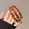 Pinza para el pelo de estampado a cuadros para mujer, nuevo modelo 2026, pinza ovalada hueca para la parte trasera de la cabeza, pinza de pico de pato grande, accesorio para el cabello de alta gama