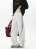 Pantalones de chándal grises de moda para hombre 2026, pantalones rectos holgados de estilo americano para primavera, pantalones deportivos casuales versátiles y fluidos
