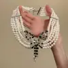 Collar Colgante de Mariposa con Cuentas Estilo Francés 2026 Modelo Nuevo para Mujer, Lujo Ligero, Diseño de Nicho de Alta Gama, Cadena para el Cuello, Cadena para la Clavícula