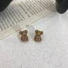 Otoño e invierno nuevo decoración de oso de flocado color diamante clip para oreja lindo estilo girly accesorios para el hueso de la oreja moda
