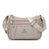 Bolsa de ombro em tecido de nylon para mulheres, grande capacidade, multicamadas, casual, adequada para o trajeto diário, leve, tecido de nylon, bolsa de maternidade