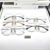 Venta al por mayor F6005, montura retro ultraligera de moda semititanio, almohadilla nasal de titanio puro, revestimiento IP de dos colores, resistente al color