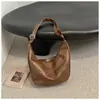 Bolsa retrô moderna de grande capacidade para mulheres, nova moda de nicho do dia a dia bolsa de bolinho, bolsa de ombro transversal para comércio exterior