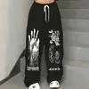 Pantalones acampanados para hombre con estampado de grafiti estilo americano otoño/invierno, pantalones casuales de calle con cordón hip-hop para baile callejero, pantalones largos para mujer, estilo urbano deportivo