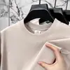 Camiseta de algodón puro de manga corta para verano para hombre, transpirable y de corte holgado, camiseta de cuello redondo para jóvenes y adultos de mediana edad, top versátil y moderno de color liso