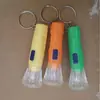 Linterna Pequeña de Bolsillo para el Hogar Cabeza Transparente Mini Linterna Pequeña Puesto Callejero Más Vendida Linterna Llavero de Plástico con Batería de Botón