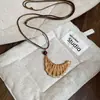 Collar Bohemio Marrón Vintage con Borlas, Estilo Étnico Hippie, Nicho 2026 Nueva Cadena para Suéter con Colgante de Mariposa