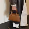 Bolso de bolos tejido retro moderno, gran capacidad, bolso de mano casual francés 2026, bolso de hombro y bandolera para mujer