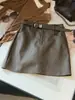 Saia elegante estilo coreano de couro PU justa ao corpo para mulheres, novo design A-line outono/inverno, emagrecedora, cintura alta, elegante e evita exposição