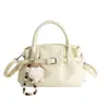 Bolso de Mano Plateado Transfronterizo para Mujer, Bolso Tote Pequeño, Nuevo Modelo 2026, Textura de Alta Calidad, Bolso Tote Cruzado Plegado de Nicho