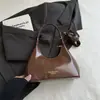 2026 Nuevo Estilo Bolso de Fiesta de Noche Bajo el Brazo Textura de Nicho Bolso de Mano Meilade Bolso de Hombro Único Cruzado para el Trabajo de Mujer