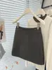 Nueva minifalda retro de mezcla de lana para otoño/invierno 2026, ajustada a la cadera, línea A, para mujer, de cintura alta, anti-exposición