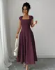 Vestido feminino longo de cor sólida, gola quadrada, corte slim, linha A, novo estilo europeu e americano, elegante e estiloso, para 2026