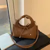 Bolso de mano texturizado transfronterizo para mujer, nuevo modelo de moda 2026, bolso de hombro versátil clásico casual, bolso cruzado suave de cuero para el día a día