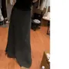 Saia midi de tricô de alta qualidade para mulheres, nova coleção outono/inverno 2026, super estilosa, design em A espessado, a saia longa estilo sereia da moda deste ano