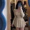 Traje Casual Perezoso para Mujer Primavera y Verano Nuevo Estilo Camisola Asimétrica + Cárdigan + Falda Corta Aspecto Adelgazante Conjunto de Tres Piezas