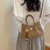 Bolso pequeño vintage para otoño e invierno para mujer 2026 nuevo bolso cruzado versátil de moda con un toque de alta gama para salir