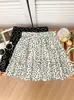 Falda elástica de cintura alta con estampado floral, efecto adelgazante, dobladillo con volantes, falda corta anti-exposición, falda de capas para mujeres petite