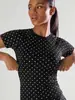 2026 Nuevo Conjunto de Yoga Sin Costuras de Lunares Europeo y Americano con Almohadillas en el Pecho, Cuello Halter, Espalda Hermosa, Shorts Levanta Glúteos, Conjunto de Dos Piezas para Fitness