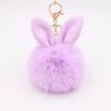 Llavero con colgante de bola de pelo con orejas de conejo, bonito colgante de peluche con orejas de conejo, bolso de piel sintética, joyería, bola de pelo.