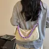 Bolso de mano nuevo para mujer estilo coreano, asa de nicho 2026, versátil para el verano, bolso cruzado de moda tejido de un solo hombro