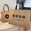 Loja de roupas de celebridade da internet bolsa de mão não tecido logotipo personalizado roupas compras presente bolsa atacado