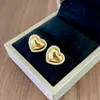 Elegante conjunto de collar y pendientes de corazón totalmente de diamantes, cadena para la clavícula de acero de titanio moderna y versátil, joyería de alta calidad de moda al por mayor