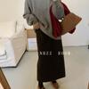 Falda recta de tubo midi elegante con sentido del diseño de abertura para mujer, estilo nuevo otoño e invierno 2024