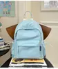 Mochila Escolar Estilo Ins Estilo Japonês Menina Doce Feminina Estilo K Cor Pura Versátil Mochila para Menina Aluno do Ensino Fundamental Aluno do Ensino Médio