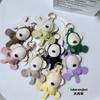 En stock al por mayor cuero niña mono mochila colgante caricatura algodón PU mono coreano bolsa colgante llavero