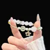Nuevo Pulsera de Borla con Cuentas de Estilo Chino, Exquisita y a la Moda, de Nicho, Bidimensional, Lujo Ligero, Versátil, Apilable, Pulsera de Cuentas Impresionantemente Hermosa