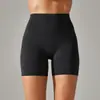 Pantalones de yoga de estilo nuevo sin línea de vergüenza color piel para mujer, cintura alta, realce de glúteos, compresión abdominal, shorts deportivos de tres puntos