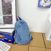 Mochila de mezclilla casual de pequeña capacidad para estudiantes universitarias, estilo japonés simple que combina con todo, mochila pequeña ligera