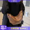 Bolsa Feminina de Grande Capacidade 2026 Novo Modelo Alta Qualidade Nicho Outono e Inverno Versátil Ombro Transversal Bolsa Dobrada Formato de Bolinho