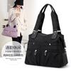 Bolso de compras moderno y versátil, bolso de viaje de moda, bolso de tela de nailon ligero e impermeable, nuevo bolso de hombro para mujer.