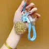 Regalos del Festival del Medio Otoño para Clientes: Pasteles de Luna, Bolsas de la Suerte, Dijes Dorados para Teléfono, Llaveros, Cadenas para Teléfono, Dijes para Bolsos