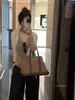 Camisola sexy de lino tejido calado estilo "old money" de alta gama para mujer, top corto de seda helada sin mangas para verano
