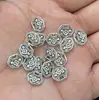 Aleación de plata de Xizang flor cerradura de longevidad flor de doble cara colgante cuentas diy pulsera collar material colgante venta al por mayor